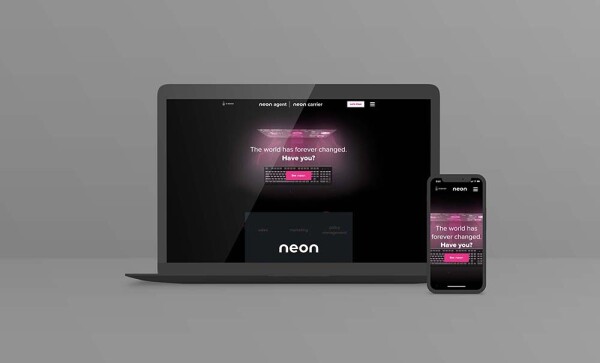 Neon company website by Alt Media Studios displayed across a laptop and a smartphone